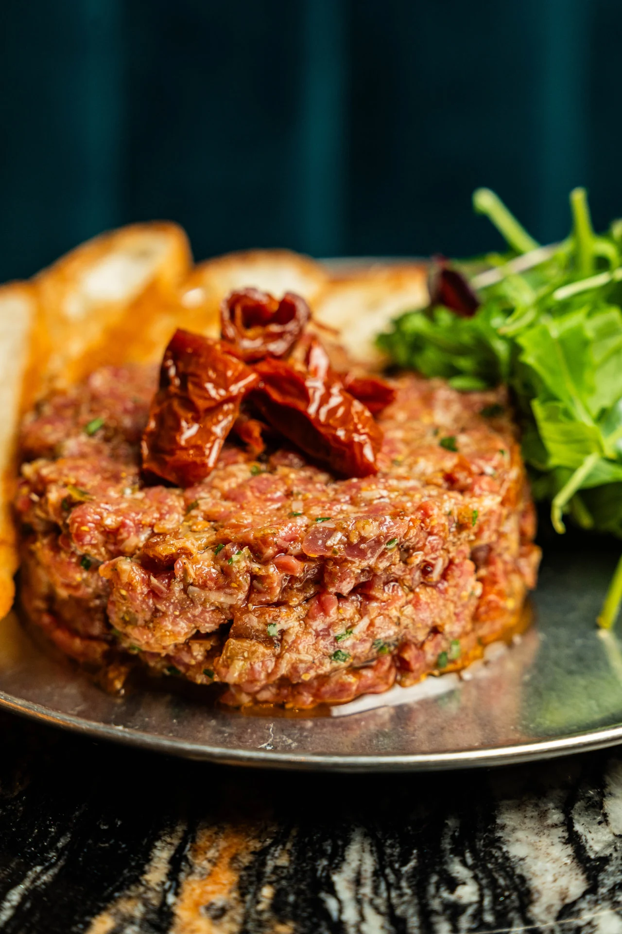 Beef tartare presented on a plate